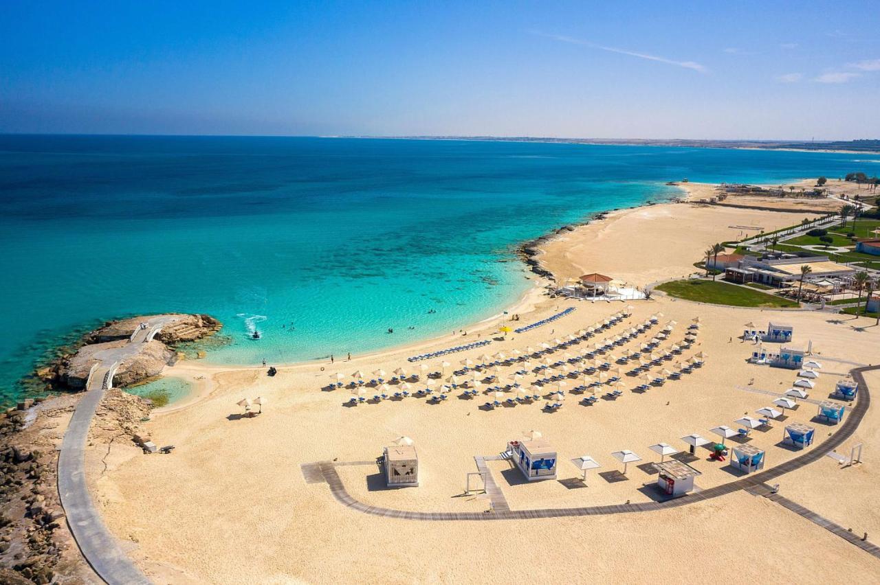 Rixos Alamein - Full Board Plus El Alamein Bagian luar foto Aerial view of the beach