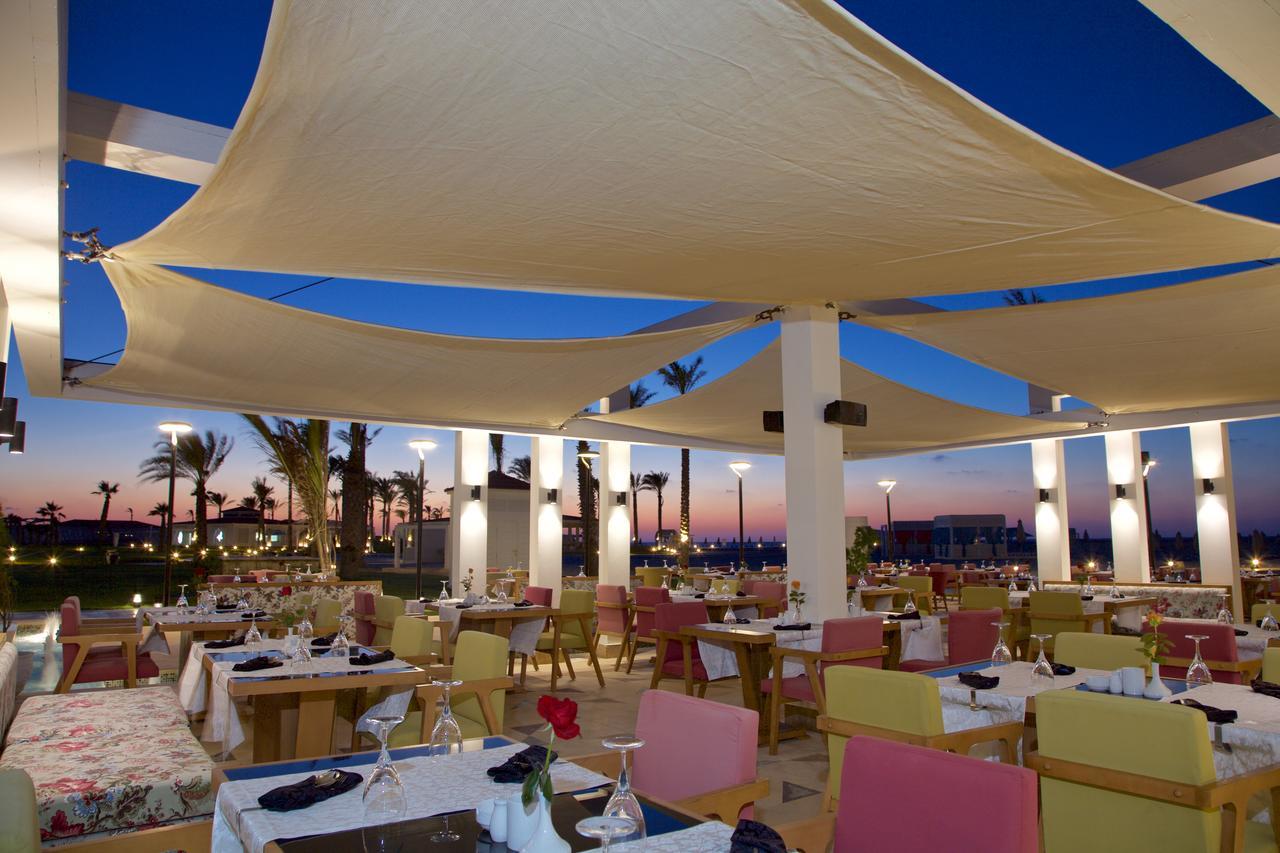 Rixos Alamein - Full Board Plus El Alamein Bagian luar foto Restaurant at the hotel