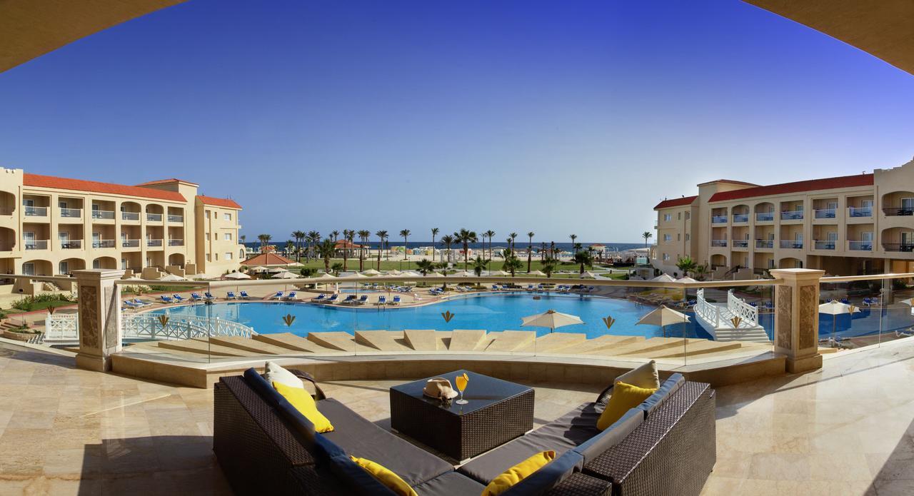 Rixos Alamein - Full Board Plus El Alamein Bagian luar foto The swimming pool at the hotel